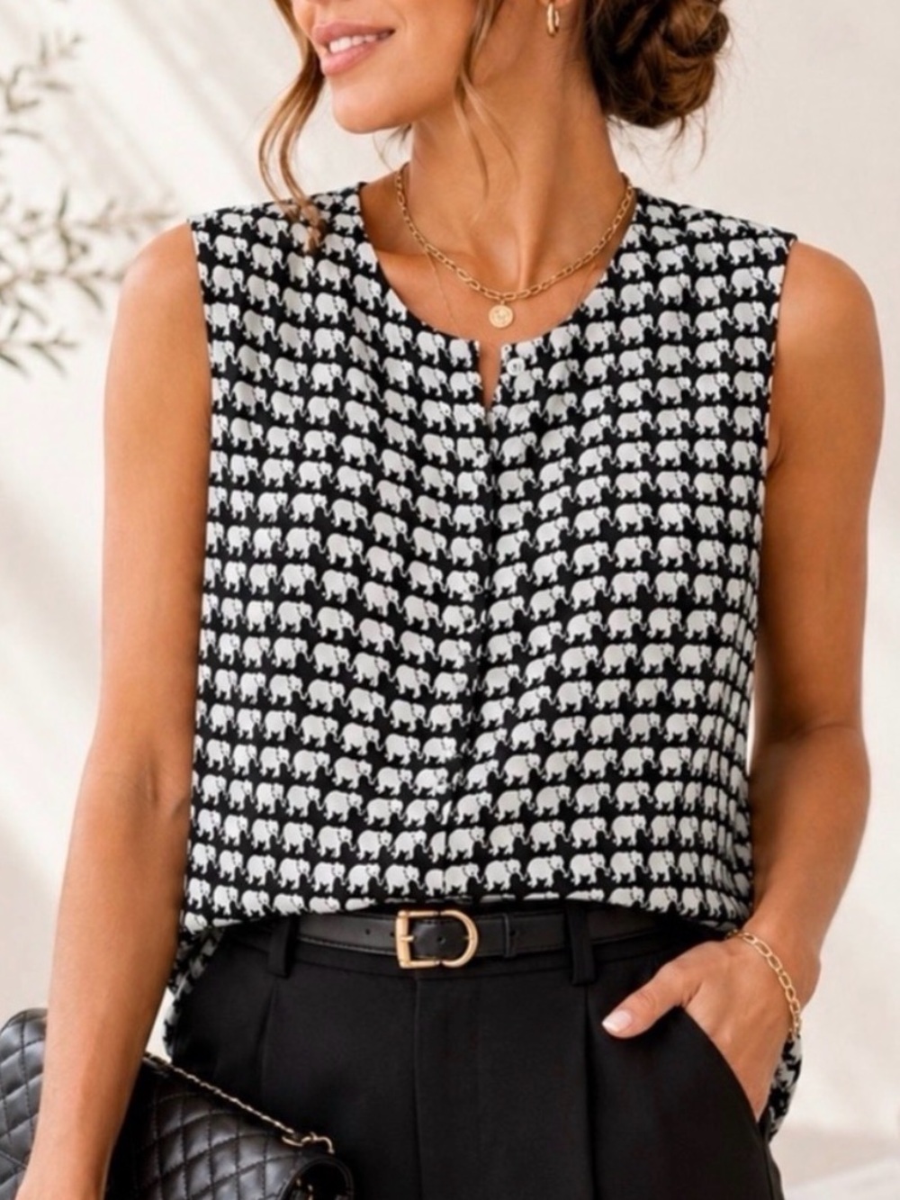 Francesca’s Elephant Print Sleeveless Blouse Black White Size Medium